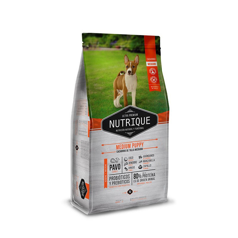 Nutrique Perro Cachorro Mediano - Premium Comida cachorro from Nutrique - al mejor precio $23990! Compra ahora en Milo Pet Shop